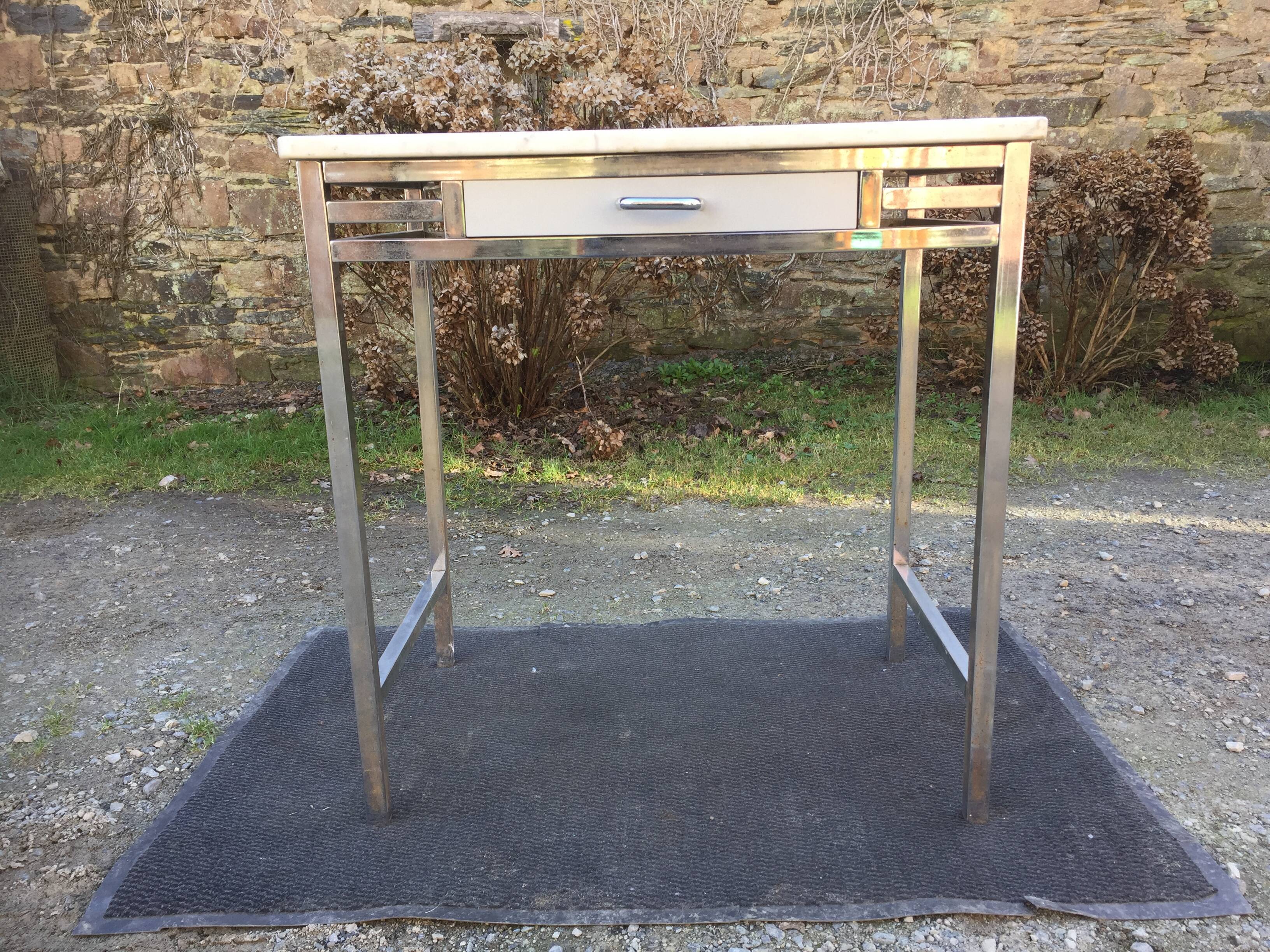 Vintage table with square chrome tubular metal base and marble top.