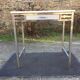 Vintage table with square chrome tubular metal base and marble top.