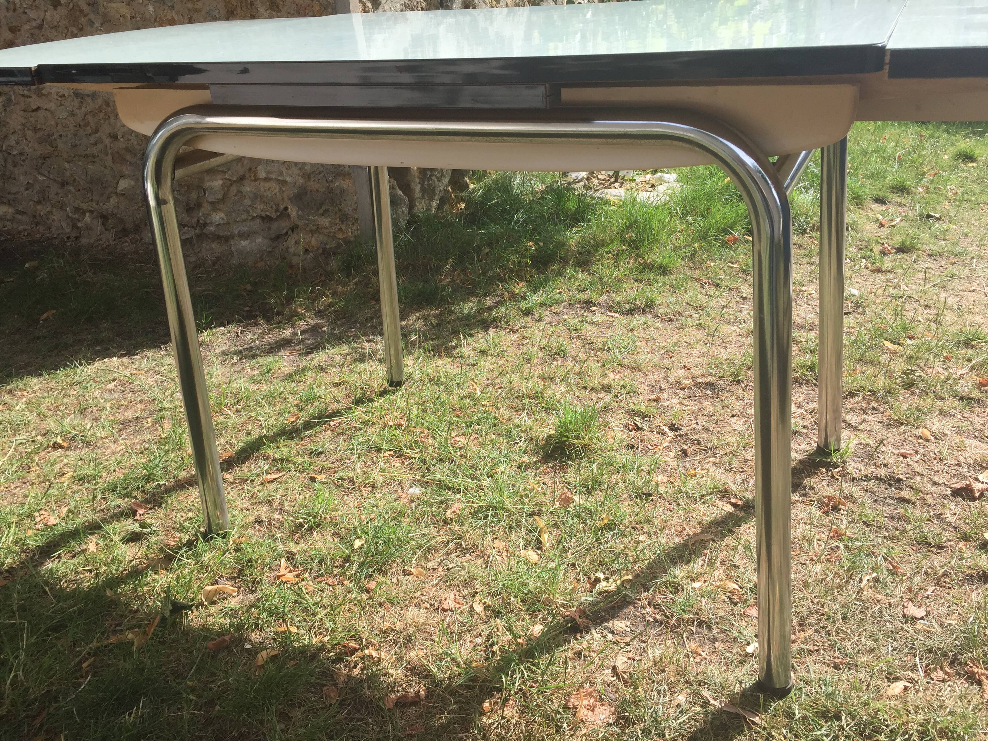 Table and 4 green water formica chairs 60's