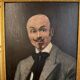 Portrait of a dandy with a moustache from the early 20th century.