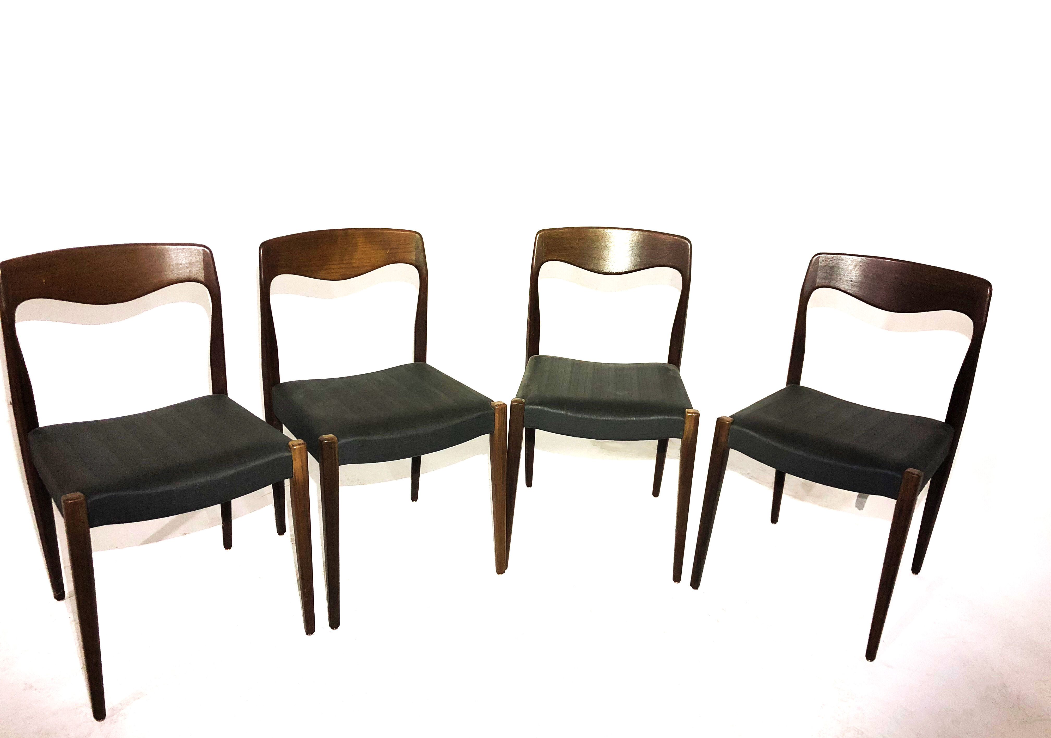 Suite of 4 chairs in teak and skai
