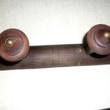 Wooden wall-mounted coat rack