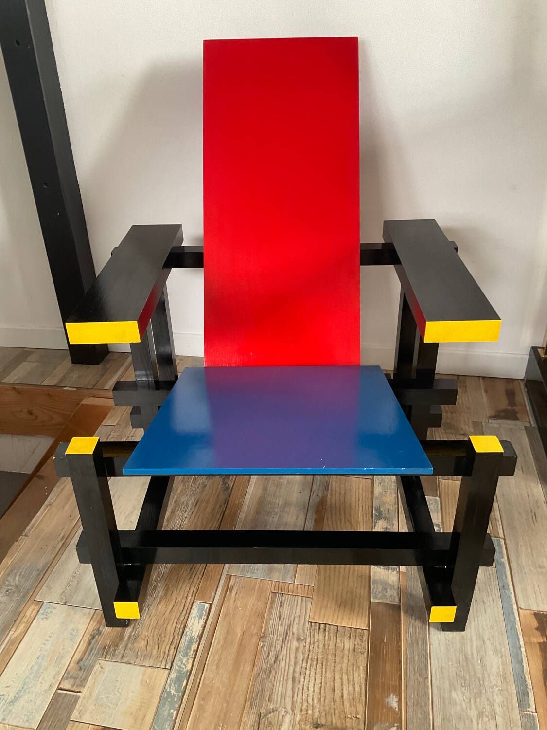 “Red and blue” lounge chair in the style of Gerrit Rietveld