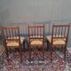 Three Louis XVI-style mahogany chairs