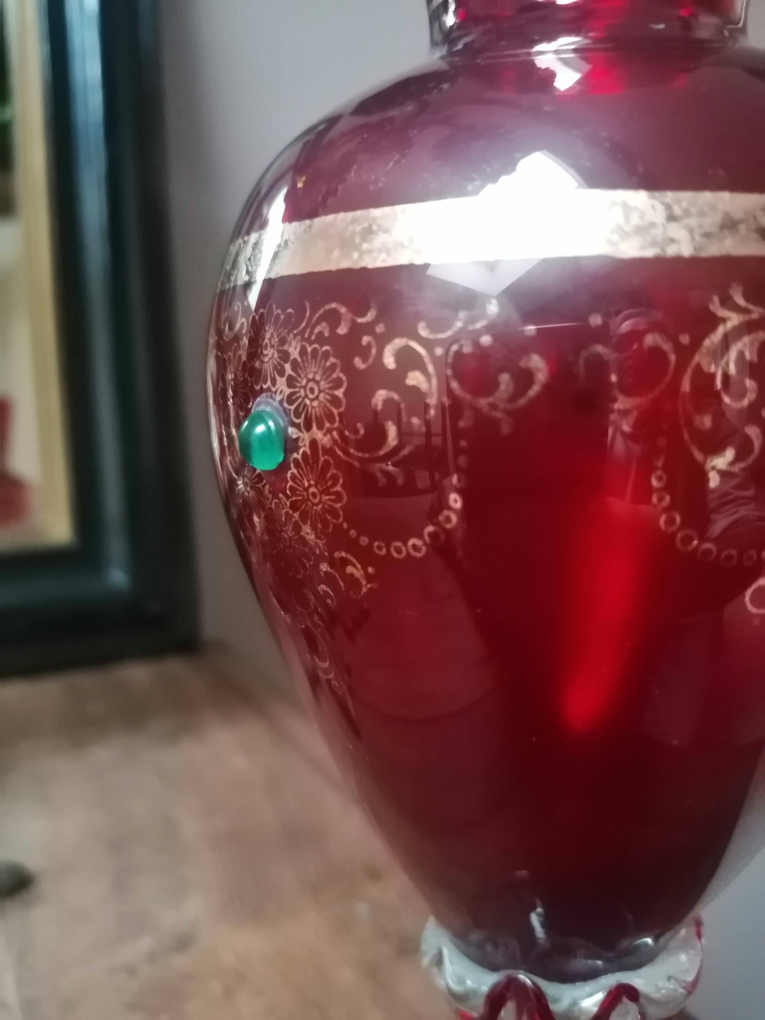 Red vase with gold decoration