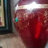 Red vase with gold decoration