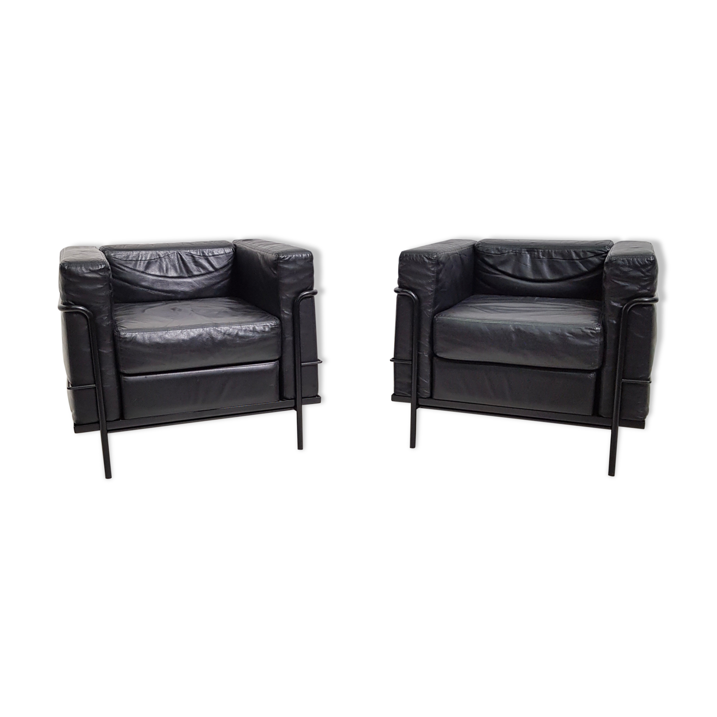 Pair of vintage armchairs Hugues Chevalier in leather 1980
