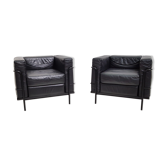 Paire de fauteuils vintage Hugues Chevalier en cuir 1980