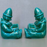 Pair of Art-Deco BookEnd Clowns drowsy in front of a book - glazed ceramics - 1930/1940