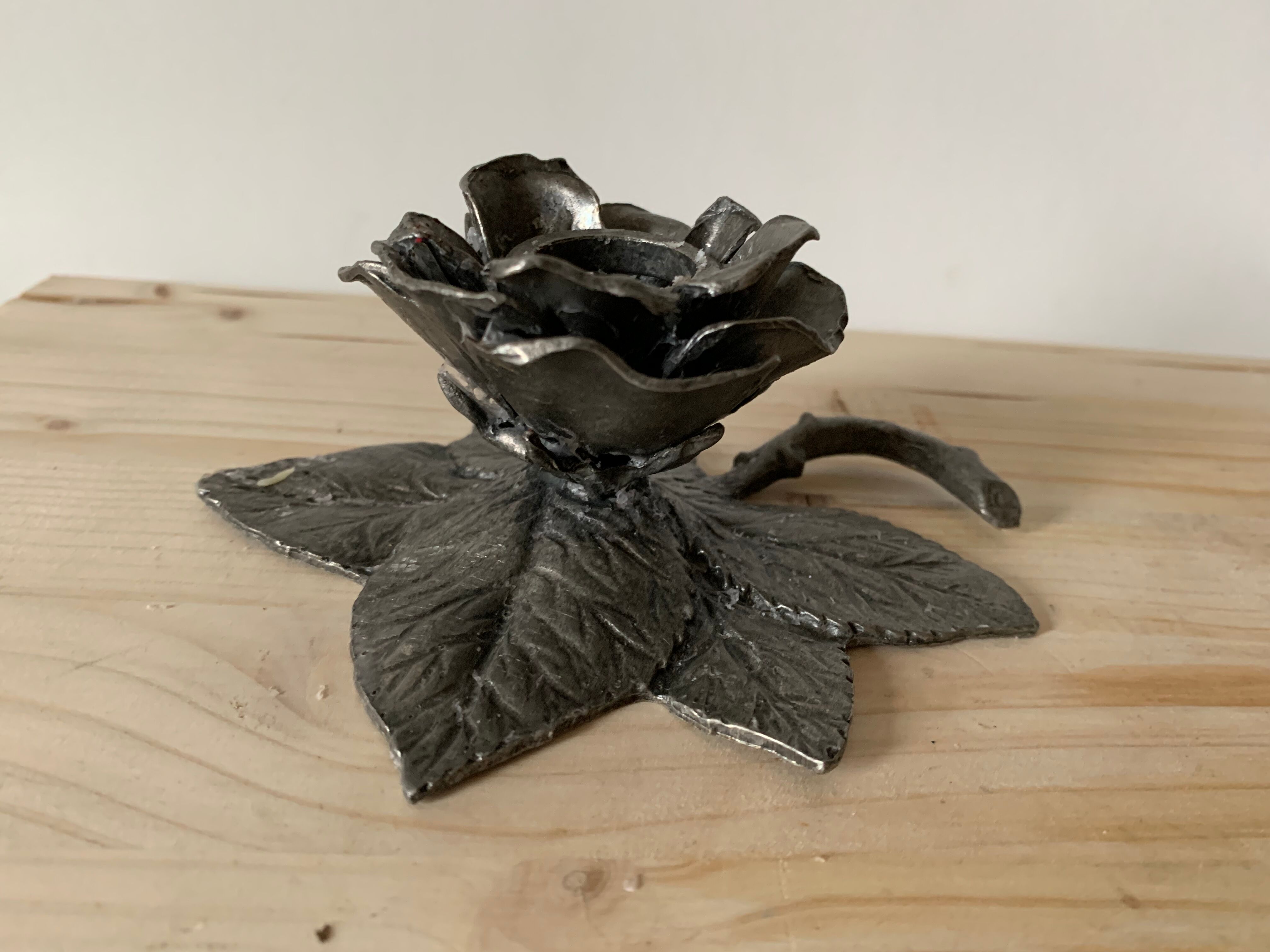 Tin flower candle holder
