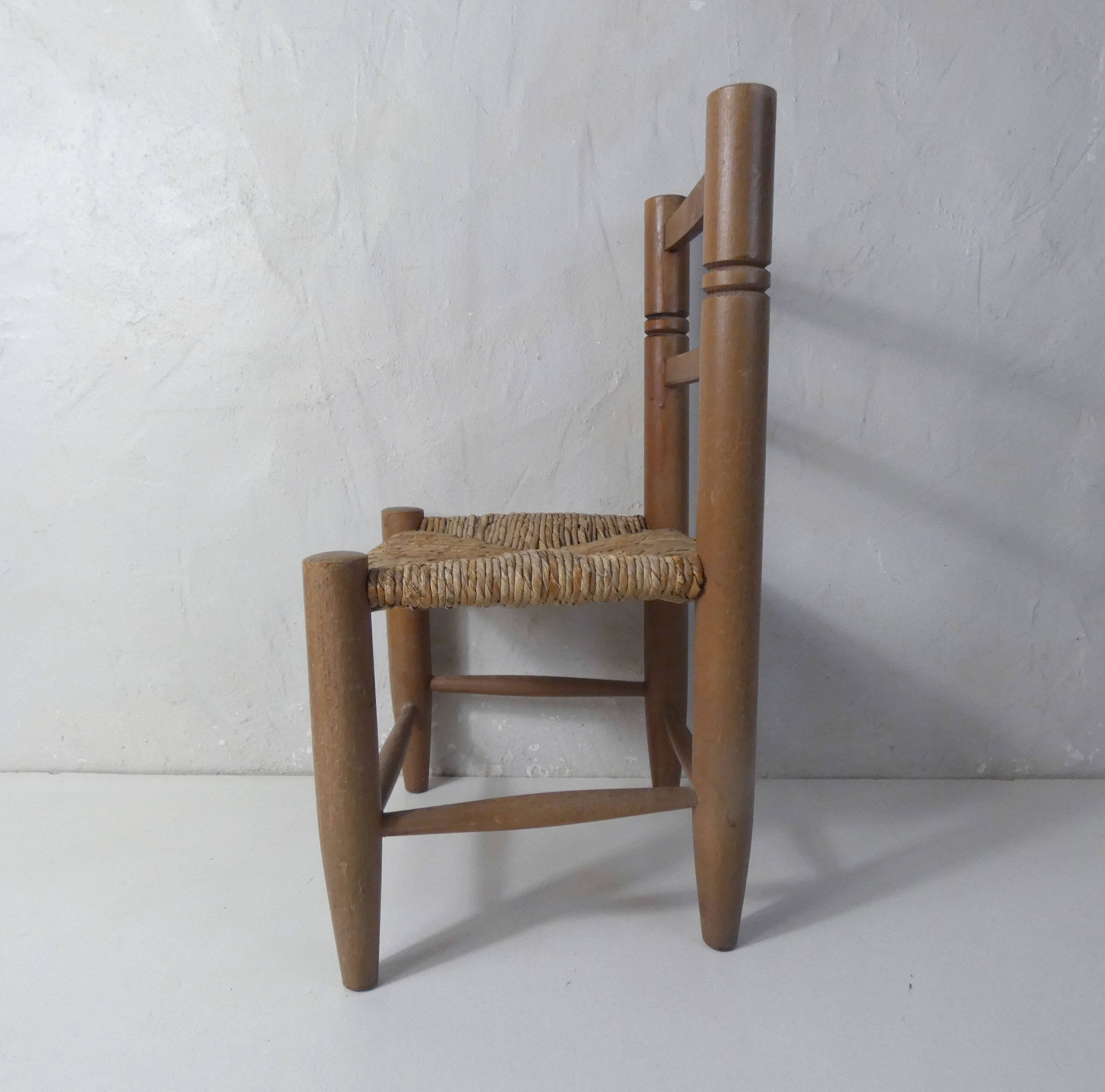 Old wooden straw chair for children