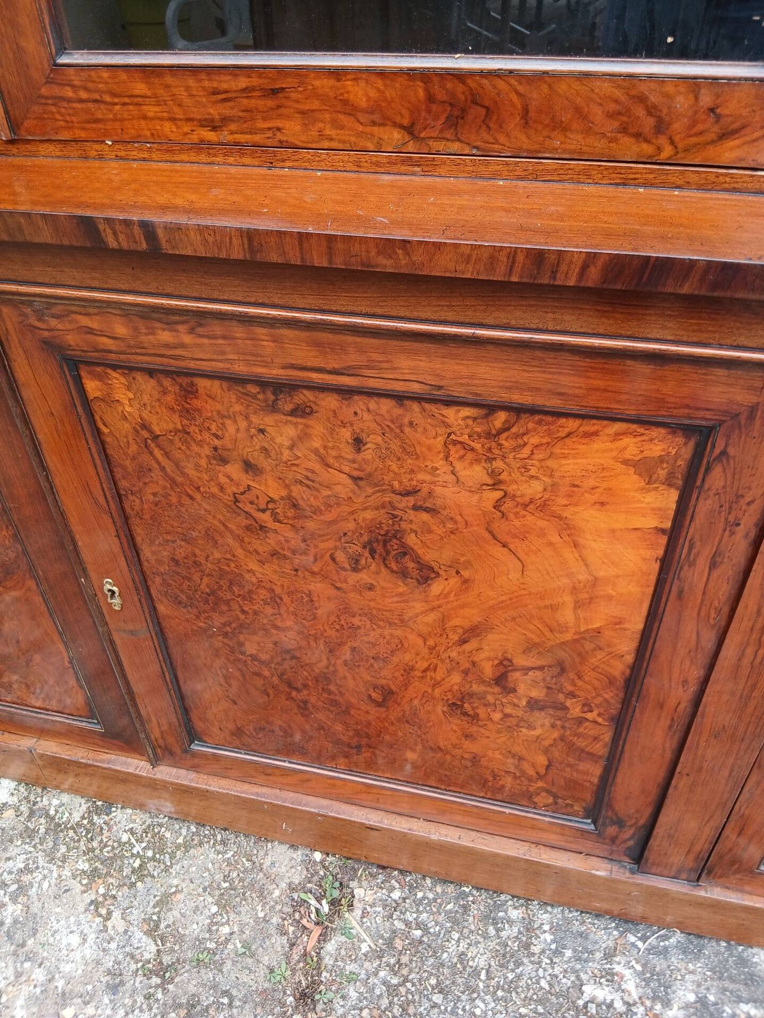 Large walnut shop library from the late 19th century.