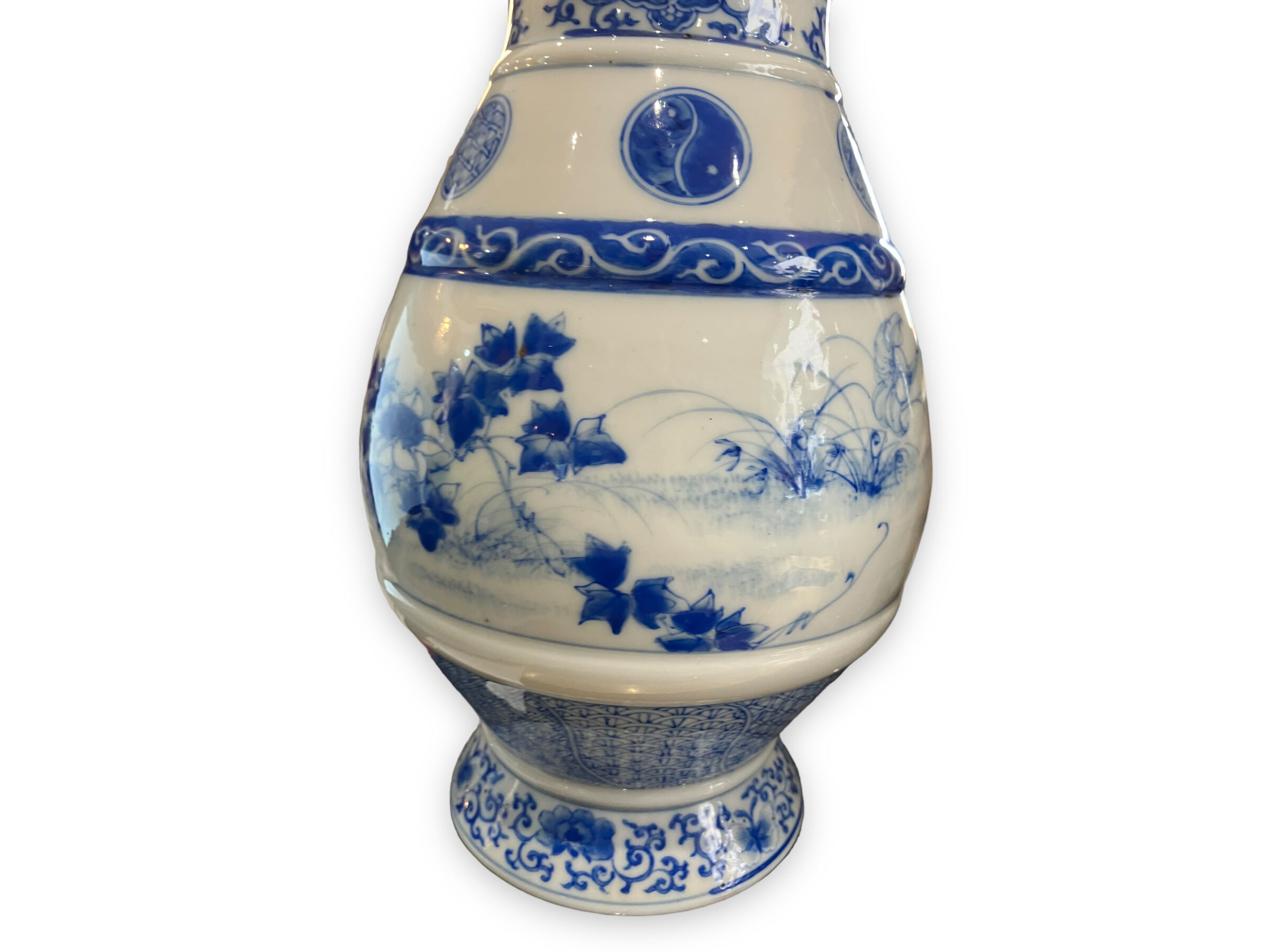 Pair of Asian vases in white and blue porcelain