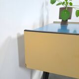 Jaren 50 ladekastje met blauw blad en zwarte poten