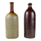 Duo of speckled stoneware and burgundy bottles, 20th century