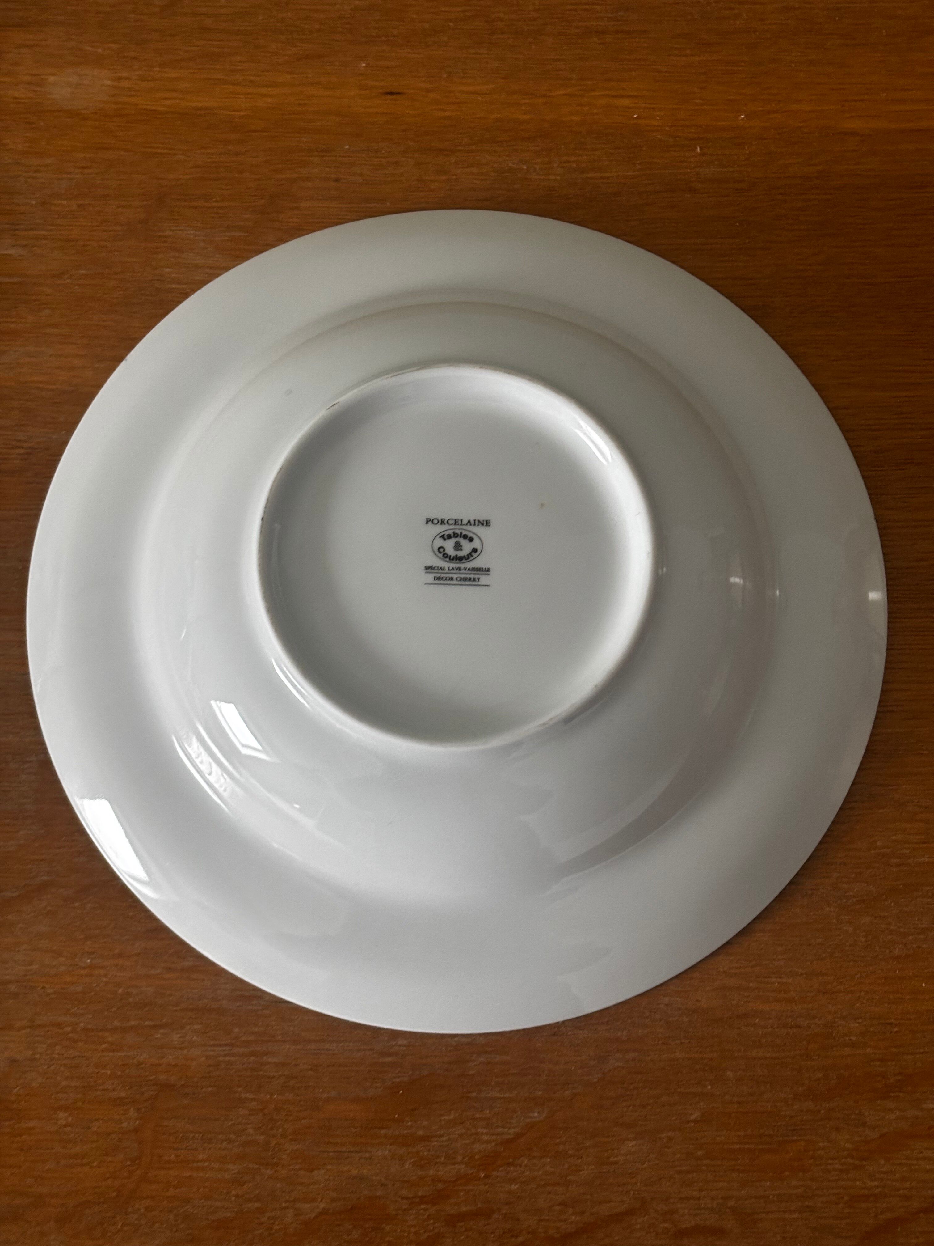 Set of 5 deep porcelain plates in cherry table colours.