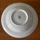 Set of 5 deep porcelain plates in cherry table colours.