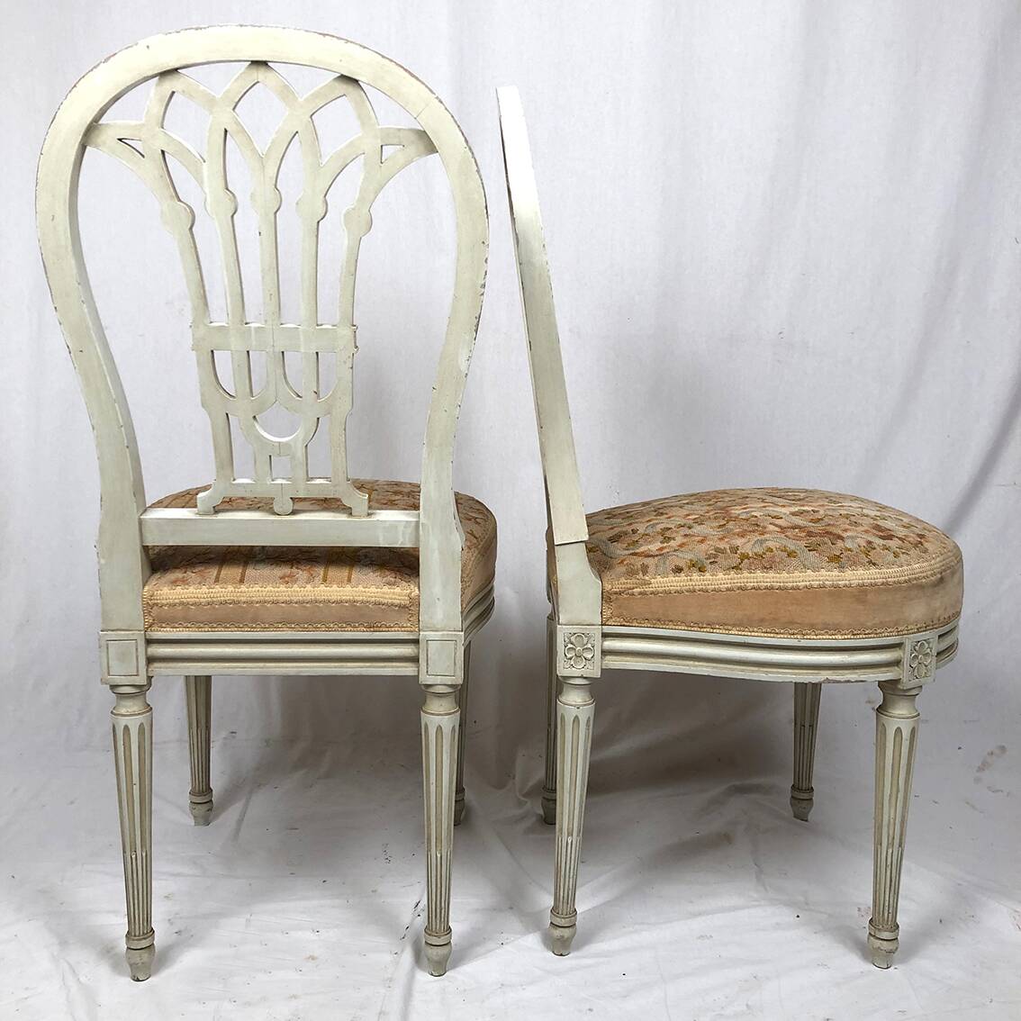 Pair of white lacquered wooden chairs in Louis XVI style, 20th century