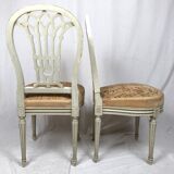 Pair of white lacquered wooden chairs in Louis XVI style, 20th century