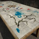 Vintage table in rattan Audoux and Minnet and ceramics Chassin 1950