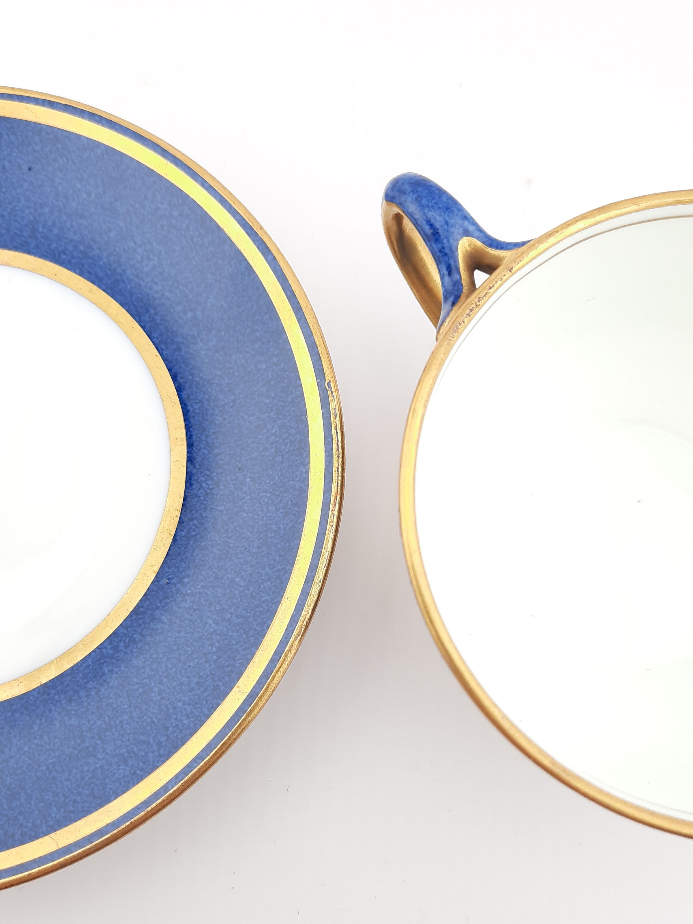 Antique Wedgwood teacup and saucer, bone china. Powder blue and gold English cup and saucer, 1900s