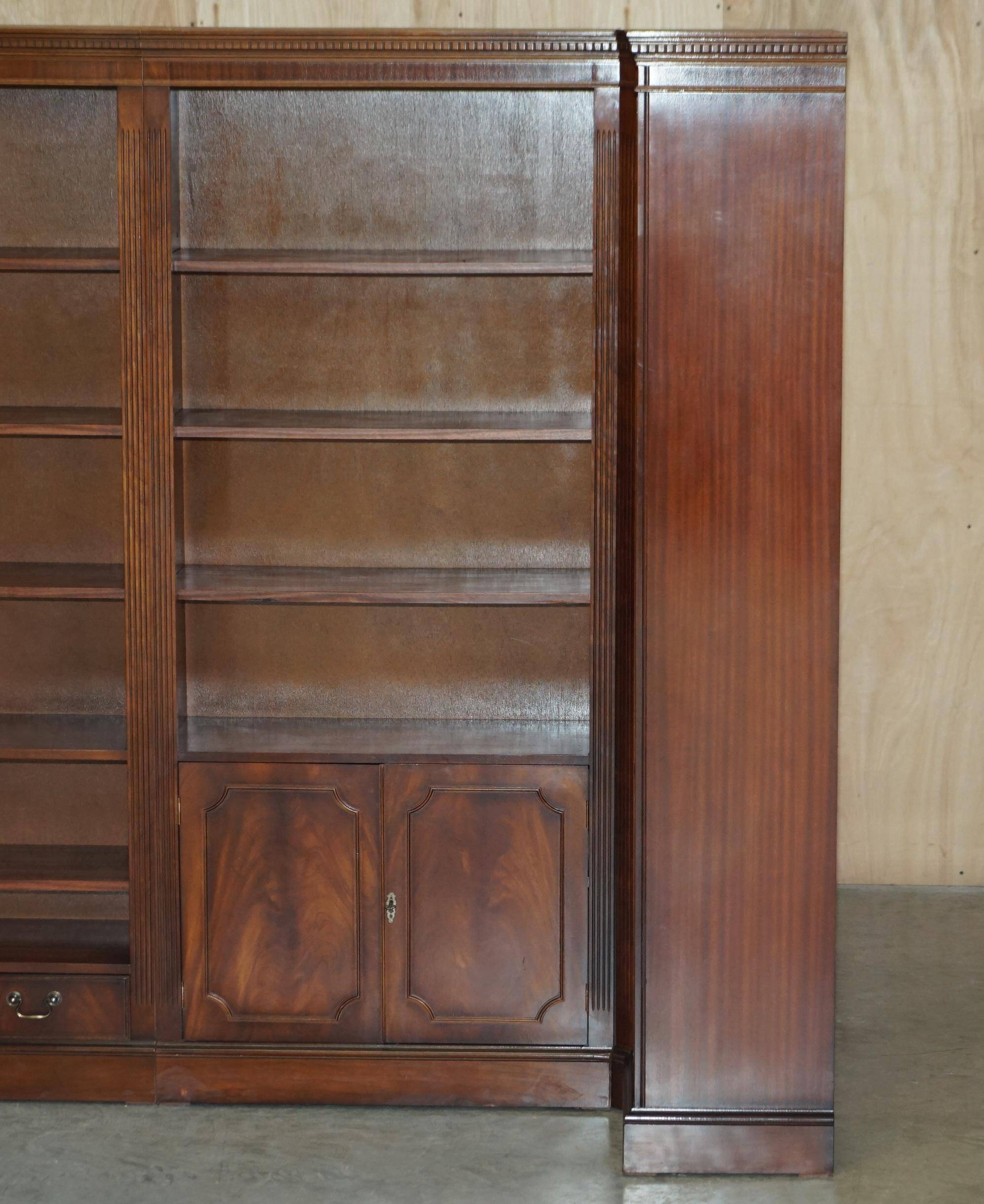 Corner library made of flamed hardwood, in 3 parts.