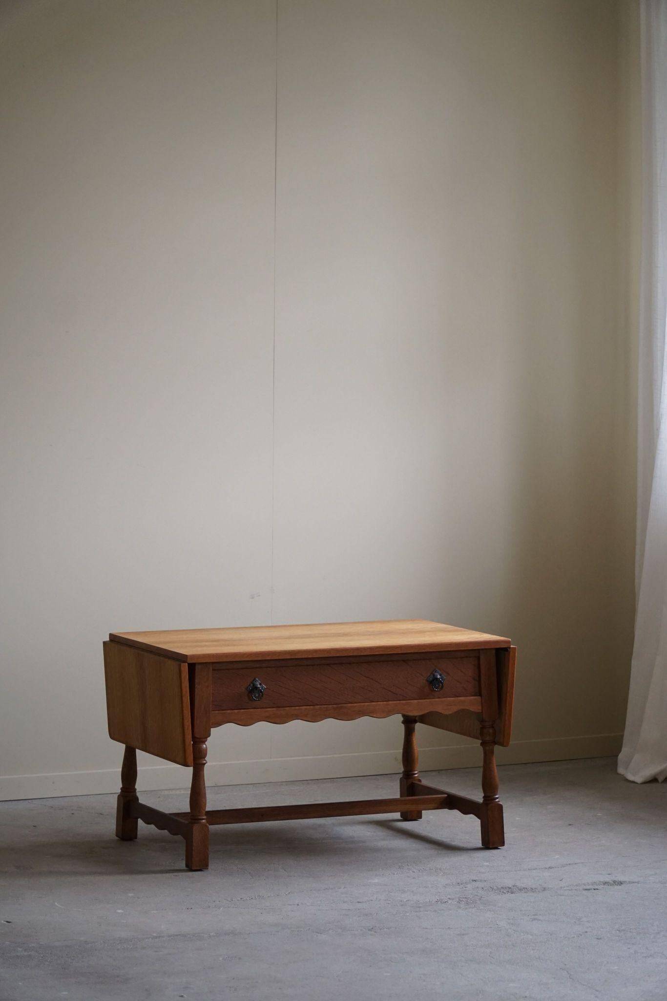 Danish folding table from the mid-century with a drawer in oak, Henning Kjærnulf, 1960s.