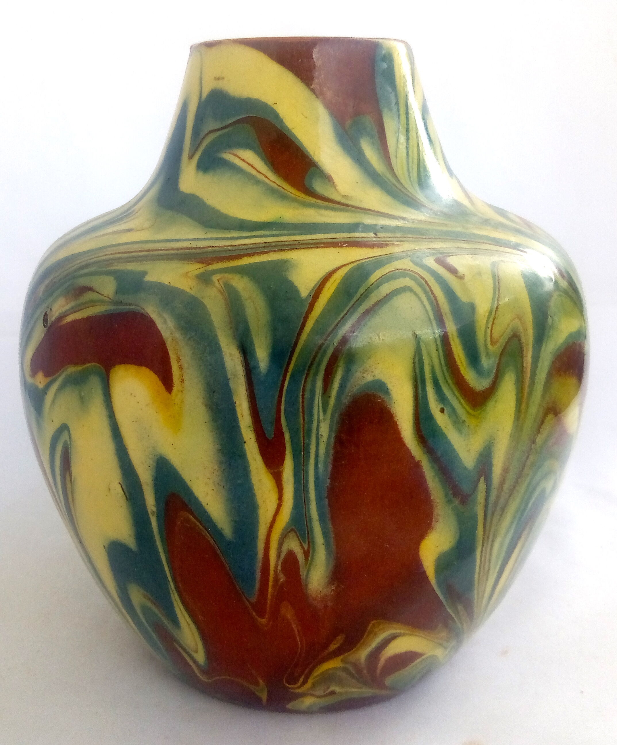 Brown, yellow and green marbled ceramic vase