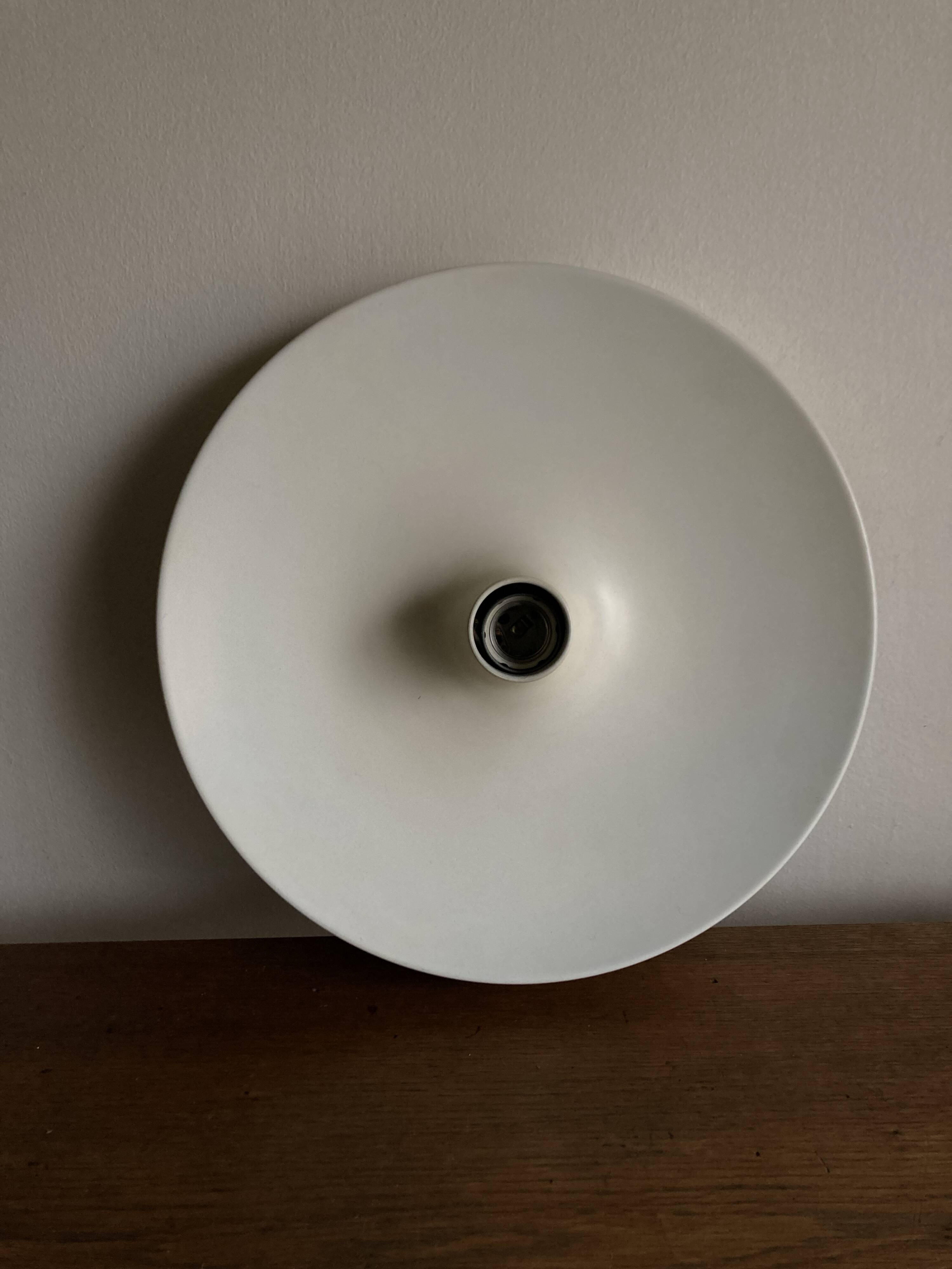 Space Age disc wall light selection by Charlotte Perriand for Les Arcs at Honsel