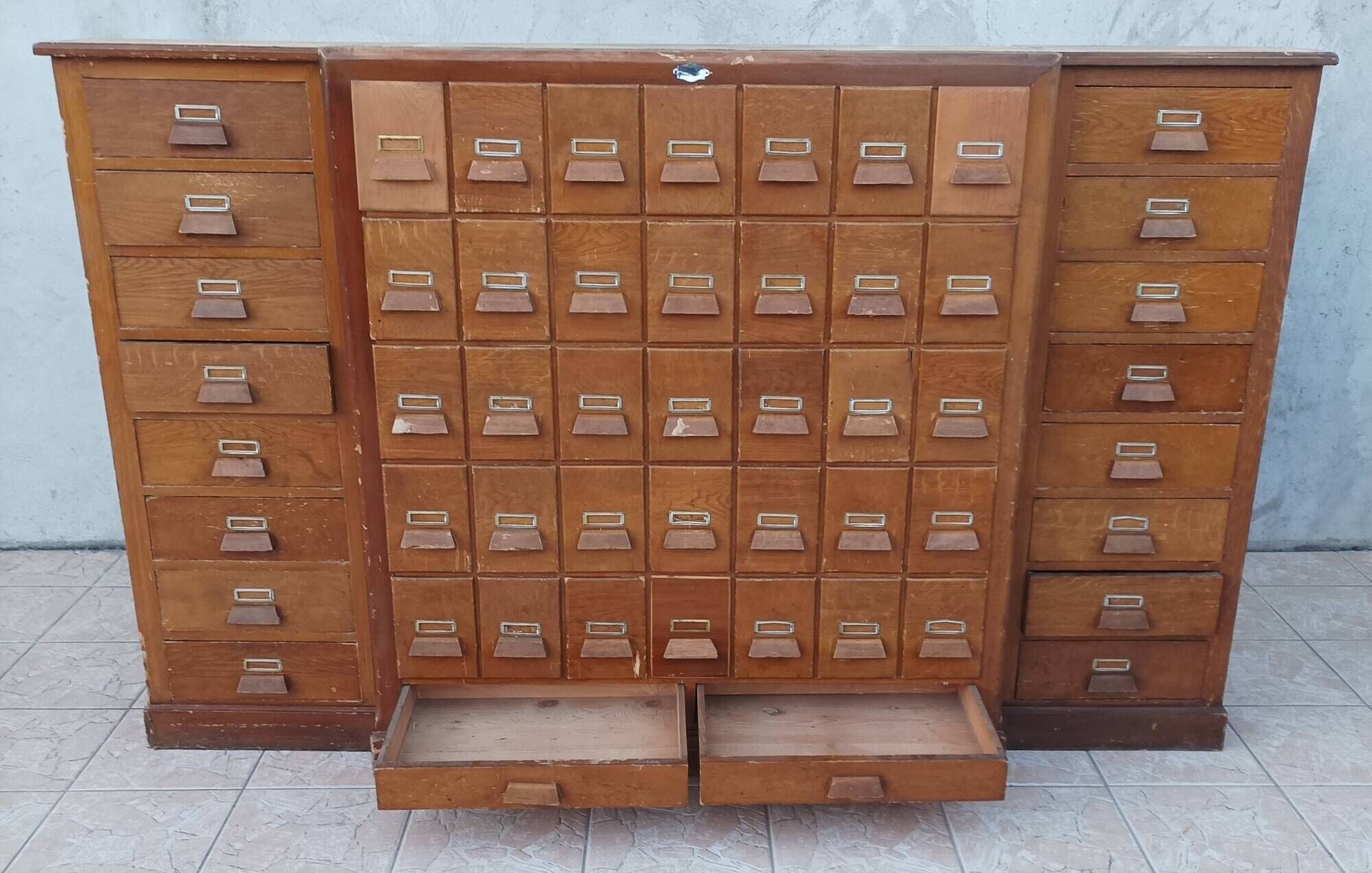 Apothecary or trade cabinet in fir with 53 drawers.