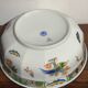 Shallow porcelain dish from Limoges Raynaud, bird decoration.