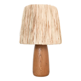 Table lamp in wood and raffia