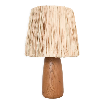 Table lamp in wood and raffia