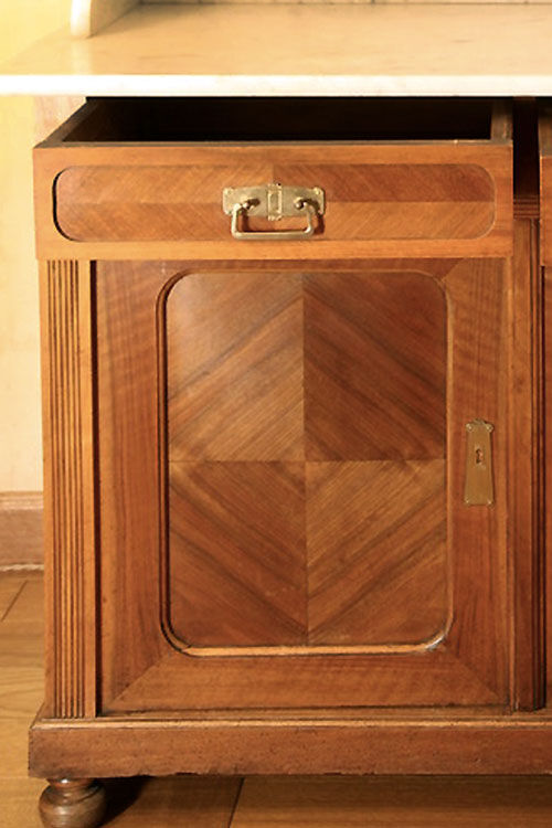 Vintage vanity toilet furniture with marble top.