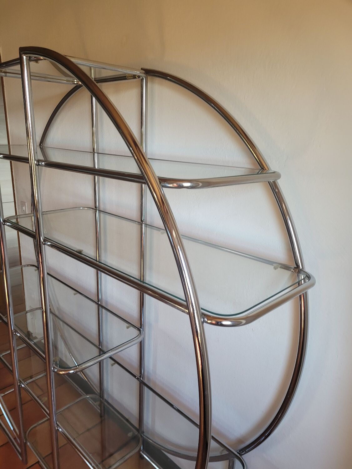 Bauhaus-style chrome round shelf