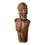 Bust Man in carved wood.
