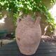 Ancient sandstone jar with two handles