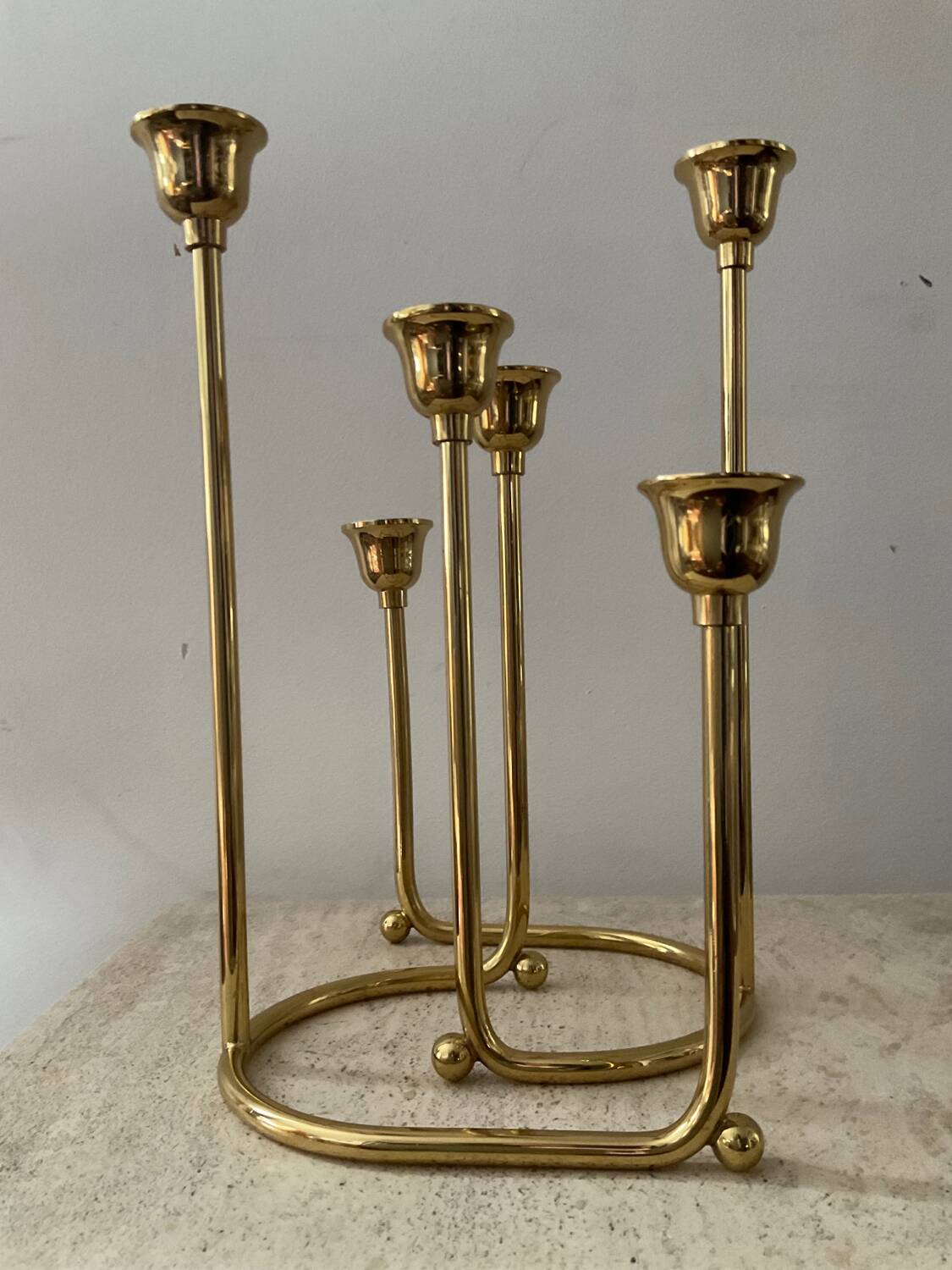 Duo of modernist brass candlesticks
