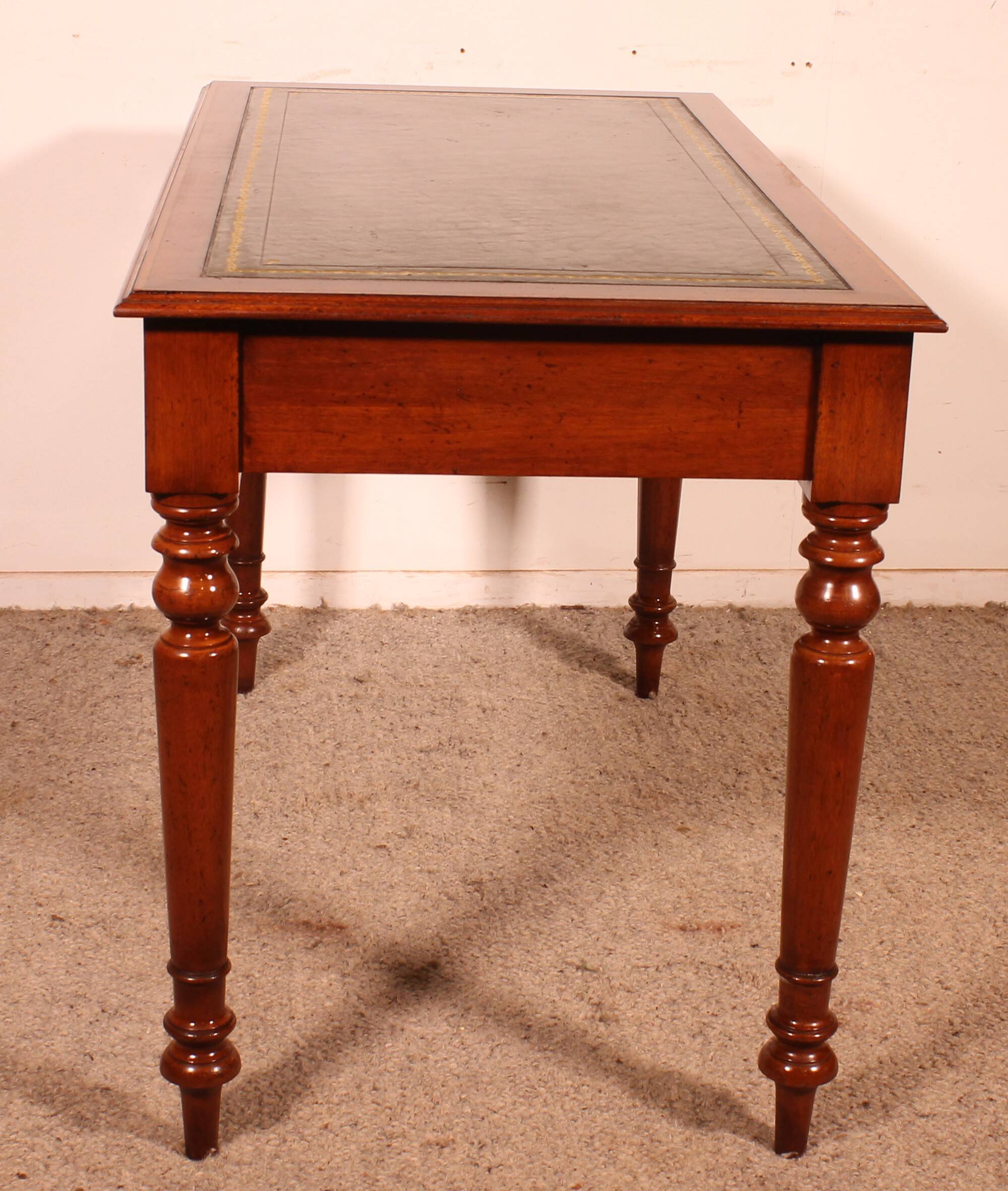flat desk with two drawers from the 19th century in mahogany and inlays