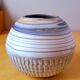 Mixed earth ceramic vase signed