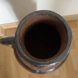 Terracotta vase with handle, partly glazed