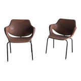 Set of 2 mid-century brown faux leather armchairs with black metal legs, 1960s.