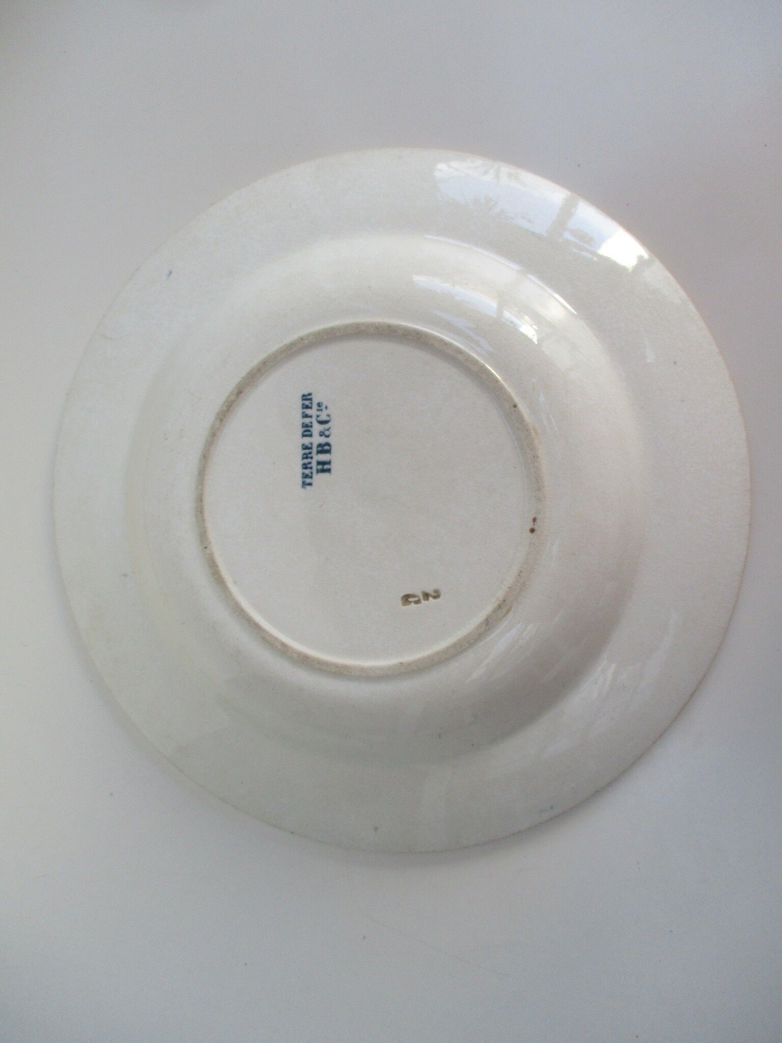 Iron earth H.B and Co. plate