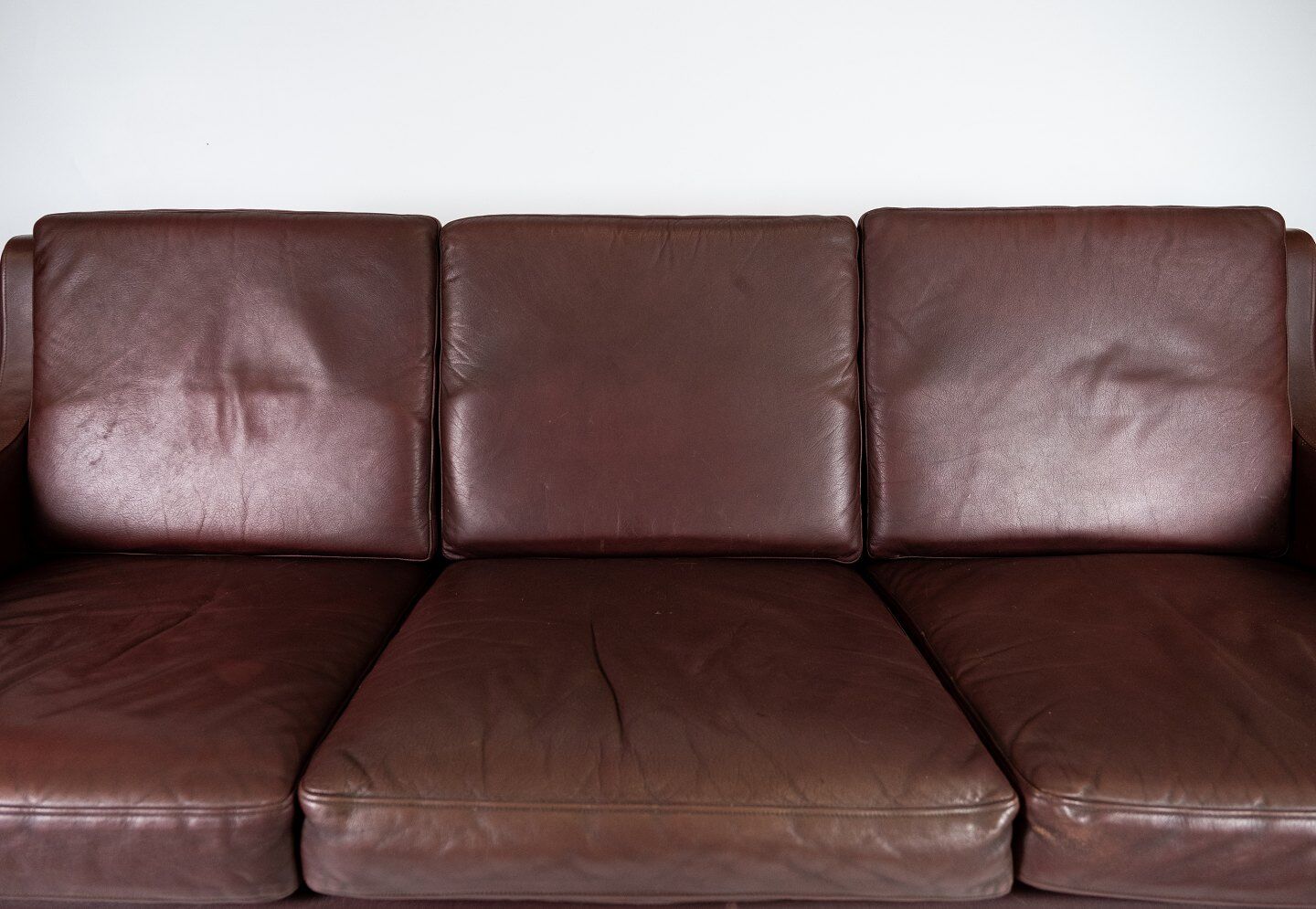 Three seater sofa, with red brown leather by Stouby Furniture from the 1960s