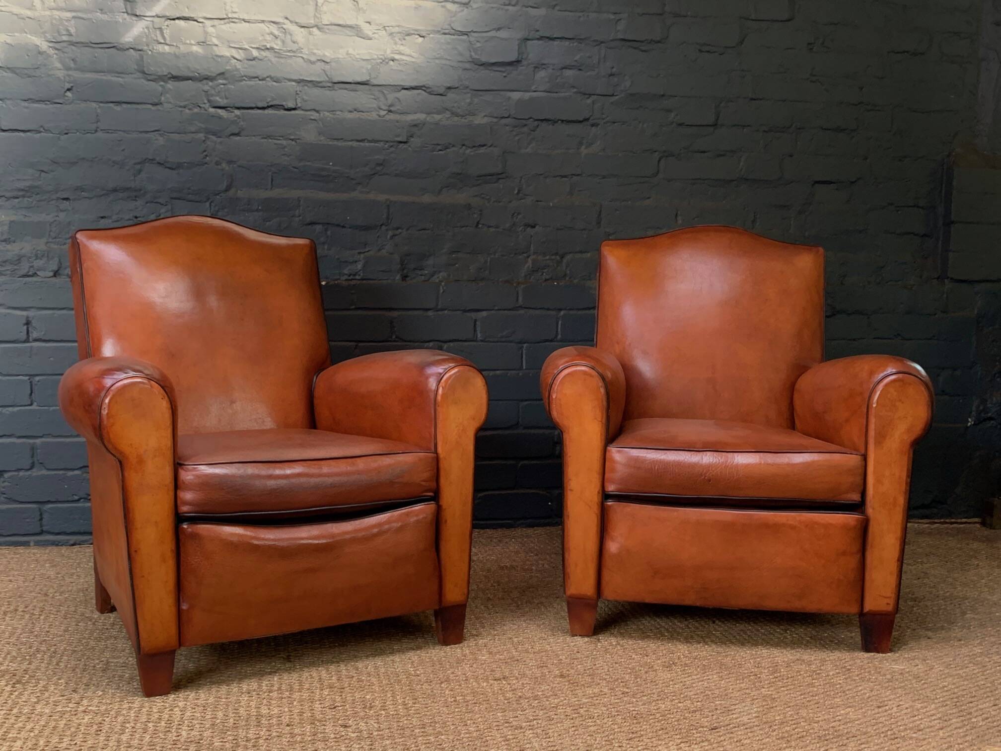 French leather club chair, chapeau de gendarme model circa 1930's in caramel