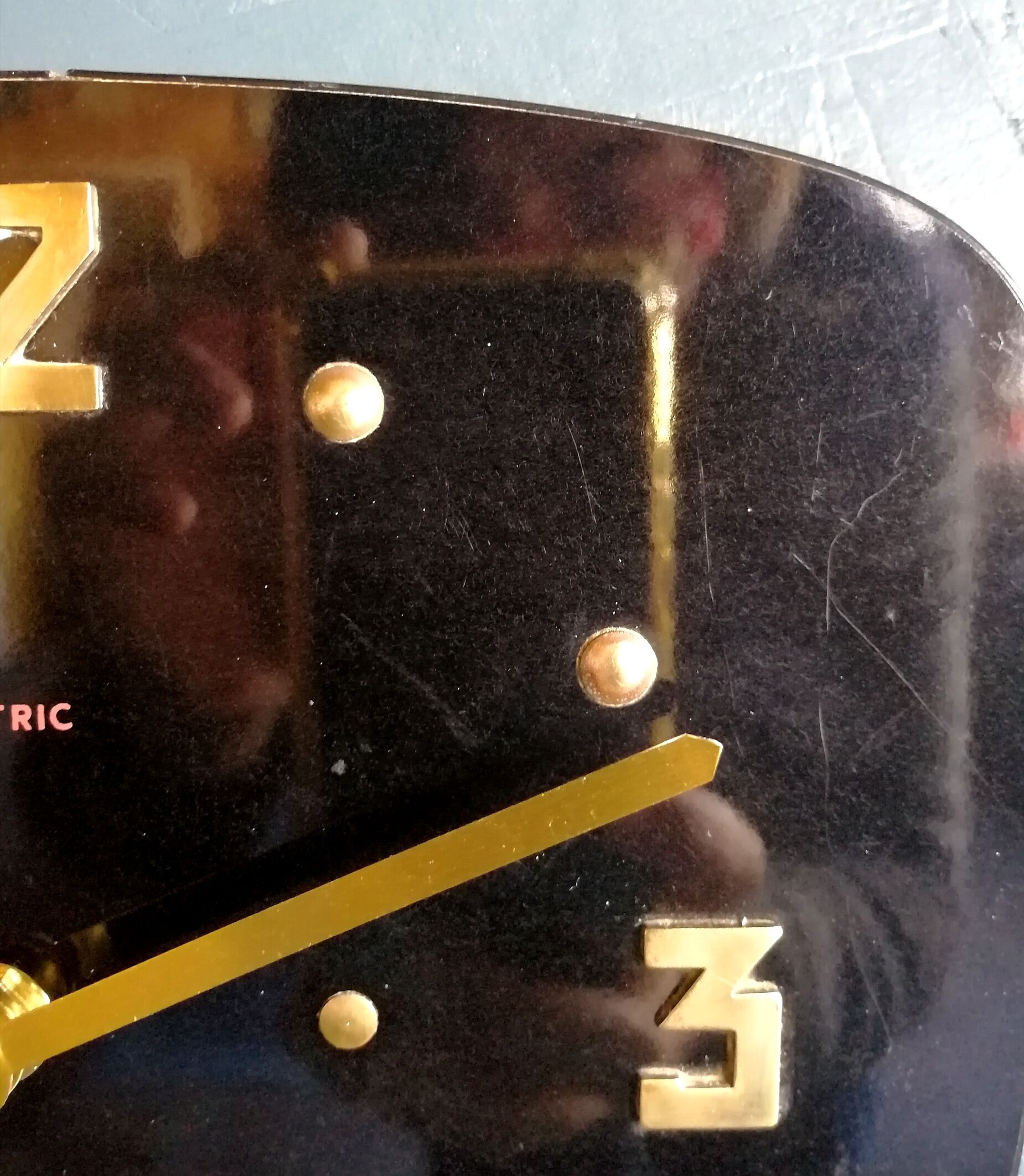 Vintage formica silent rectangular wall clock "Electric golden black"