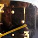 Vintage formica silent rectangular wall clock "Electric golden black"