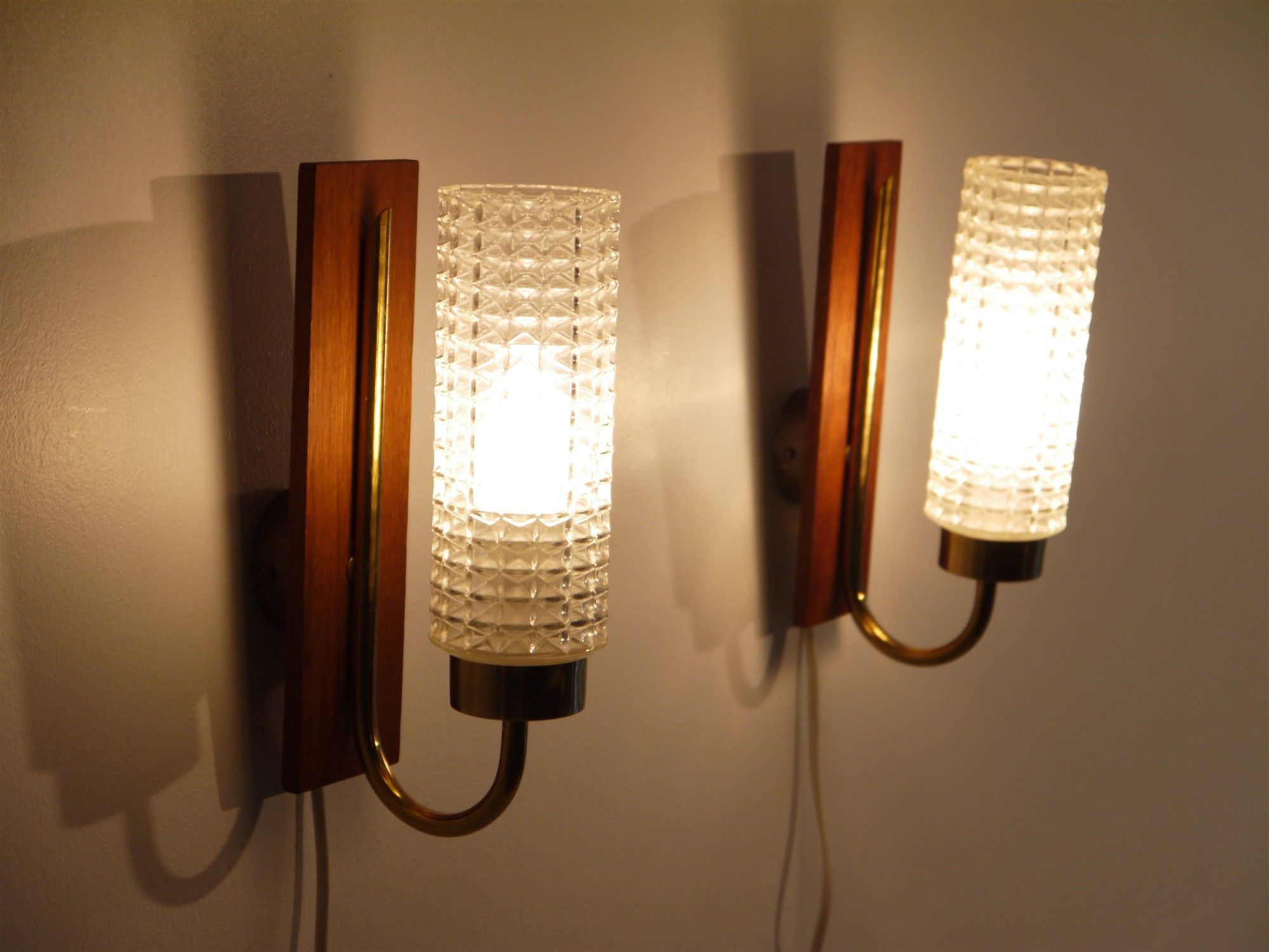 Pair of Scandinavian vintage teak and glass appliques