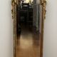 Miroir rocaille en résine dorée 98x34cm
