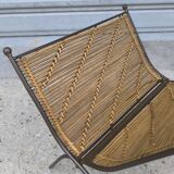 Wrought iron and wicker magazine rack